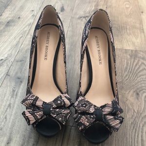 Lace open toe heels with bow accent